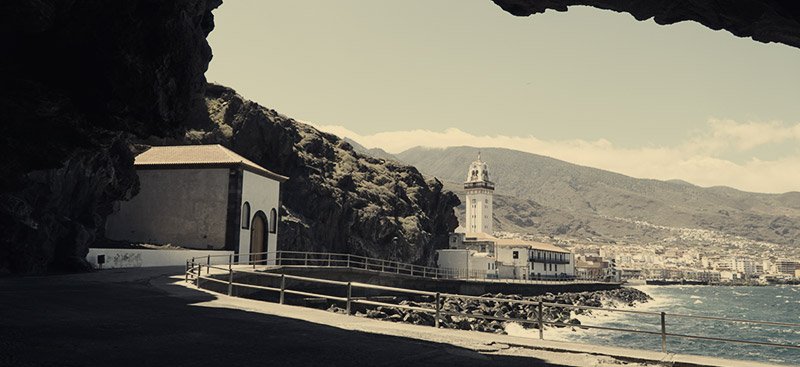 Candelaria, The St. Blas chapel in front of the Achbinico cave, the Basilica in the background, 2018 Candelaria