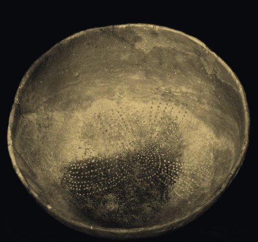 A found ceramic bowl with typical stellar dot patterns Microceramics